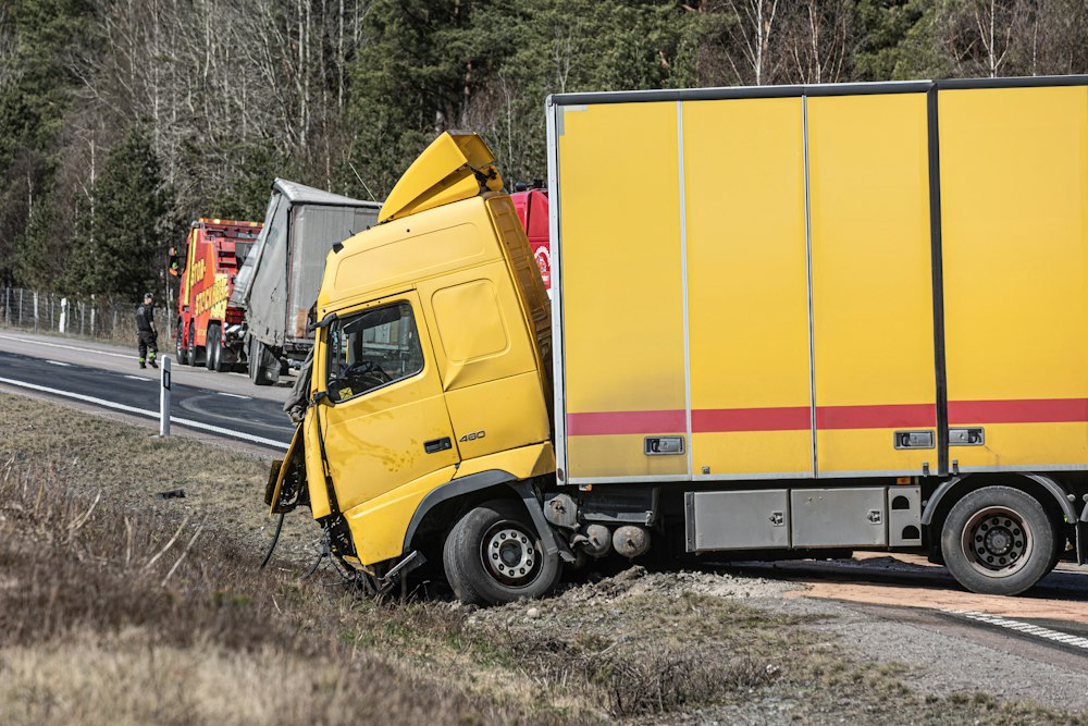 Semi truck crashed at the side of a highway
